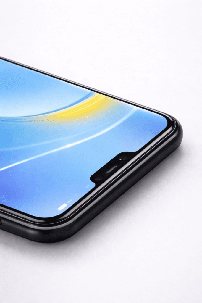 Close-up of wide notch smartphone display corner with tempered glass, showing secure edge adhesion and lift-free for long-term use.